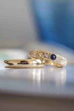 Wedding rings set for couples: classic band for him, ivy leaves band with sapphire and diamonds for her